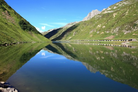 Lake in front of a wonderful mountain scenery の写真素材