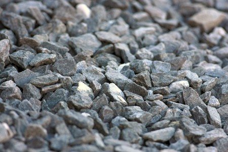 Close view of a gravel surface with focus in the centerの写真素材