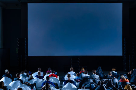 empty screening room with beanbags, set for startup pitch night and indie premiere, alternating black, cinema in a historic building, distinctive venue arrangement description,の写真素材
