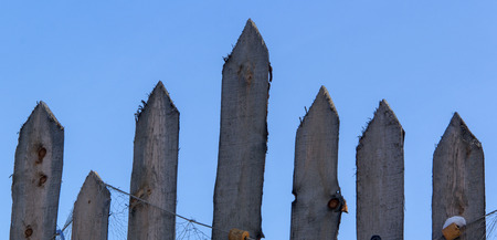 Old fence edging boards connected to each other