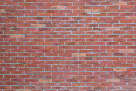 Texture brick wall of aged red brick