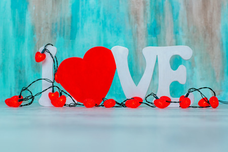 Garland in the form of hearts and an inscription loveの写真素材