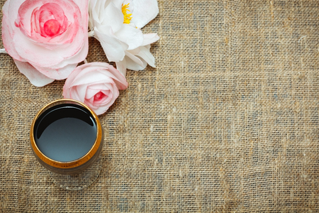 glass of red wine and flowers, flat layの写真素材