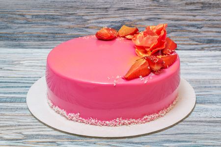 mousse cake decorated with strawberries, close upの写真素材