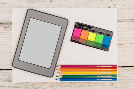 View from the top: ebook, stickers and colored pencils, closeupの写真素材