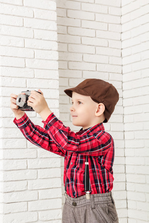 little boy in a cap photographs, side viewの写真素材