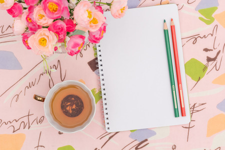 Morning tea and green notes, view from aboveの写真素材