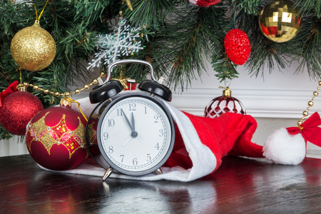 Five minutes to twelve, and Christmas tree in the backgroundの写真素材