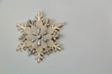 decorative snowflake on the wall with space for textの写真素材