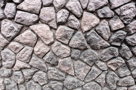 Texture of coarse artificial stone closeup. Copyspaceの写真素材