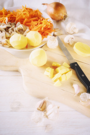 chopped potatoes and ingredients for soupの写真素材