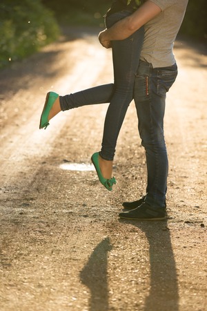 feet of lovers against a declineの写真素材