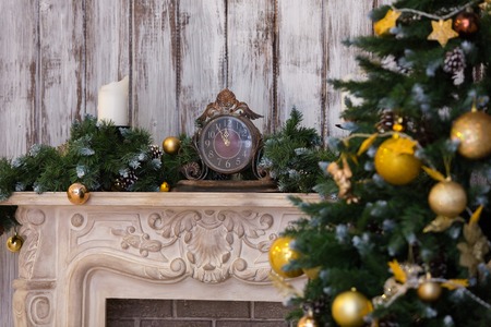 the stone fireplace decorated with a New Year's decorの写真素材