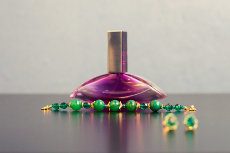 violet perfume and female green braceletの写真素材