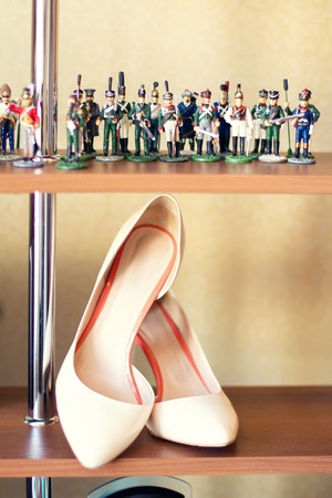 white wedding shoes and figures of soldiersの写真素材