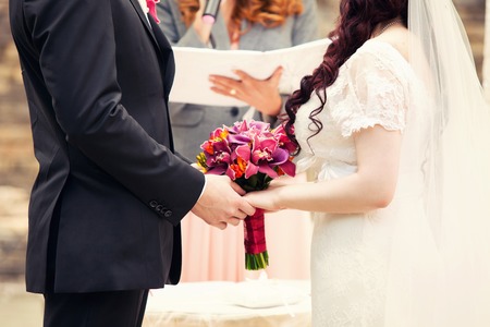 oath of the groom and bride during wedding registrationの写真素材
