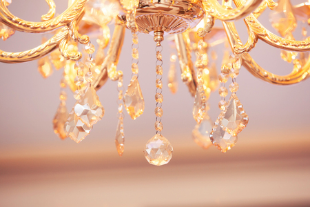 beautiful crystal chandelier on a ceilingの写真素材