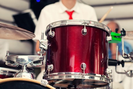the drummer plays percussion instrumentsの写真素材