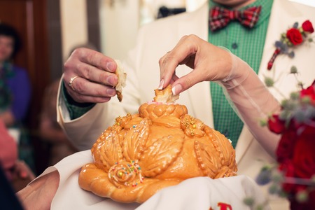 Beautiful baked loaf. Traditional food at slavic weddingsの写真素材