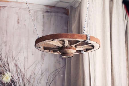 room interior in style a rustic with a vintage wheelの写真素材