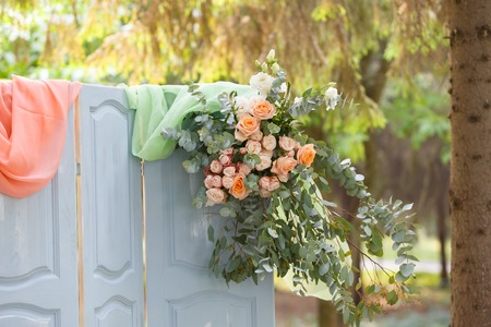 wedding arch in the form of magic wooden doorsの写真素材