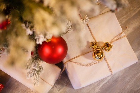 Top view of beautiful Christmas gifts under a treeの写真素材