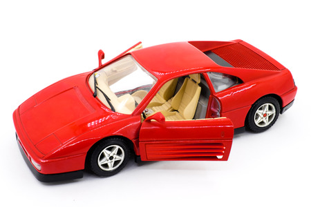 Model of red sports car on a white background closeup
