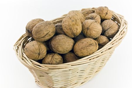 Young,fresh walnuts on the basketの写真素材
