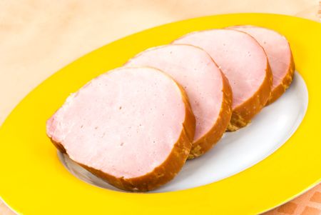 slices of baked and smoked ham