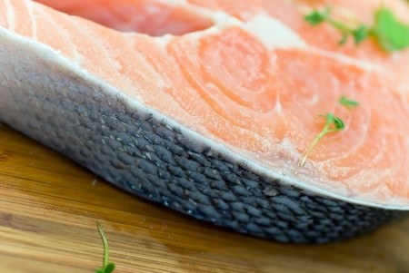 a raw salmon ready to grill. close upの写真素材