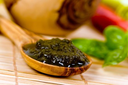 pesto with basil and black olive aroundの写真素材