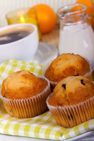 breakfast with muffin,coffee,milk and orange juiceの写真素材