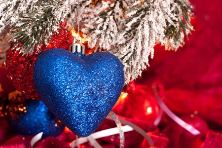Christmas candles and baubles on darkの写真素材