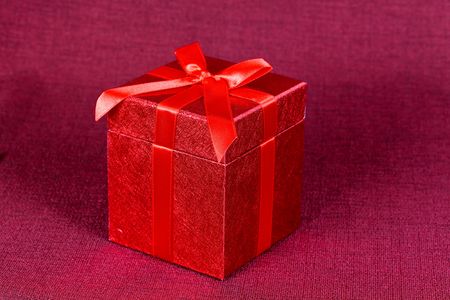 gift box,with red ribbon,isolated on whiteの写真素材