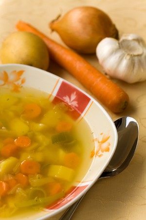 clear soup with mixed vegetable,carrot,potato,parsley,onion, の写真素材