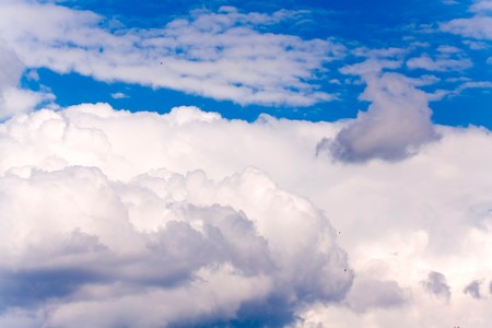 background of a beautiful sky with white clouds の写真素材