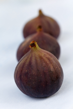 fresh figs on a blue backgroundの写真素材