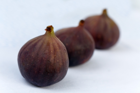 fresh figs on a blue backgroundの写真素材