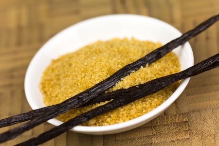 Vanilla beans and brown vanilla sugar, close up shot