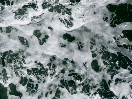 Foam of waves.の写真素材