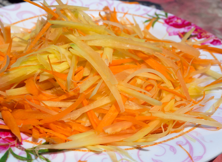 Papaya line were chopped to prepare a papaya salad. In Thailand they called it Som Tam.の写真素材