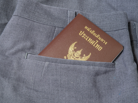 Passport of Thailand in the back pocket of Gray shorts.の写真素材