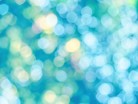 Abstract colorful photo of light  and glitter bokeh lights background. Image is blurred and made...