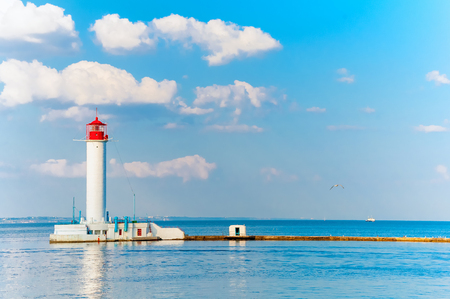 Odessa red and white lighthouse in bright sunny summer dayの写真素材