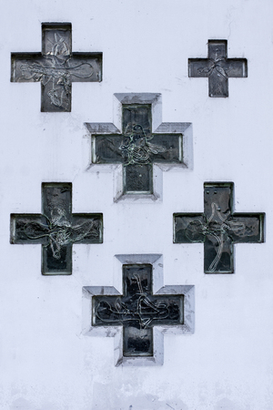 Wall of church with glass christian crossesの写真素材