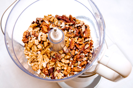Modern mixer with walnuts on the kitchenの写真素材