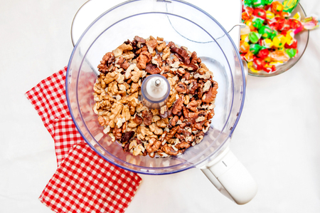 Modern mixer with walnuts on the kitchenの写真素材