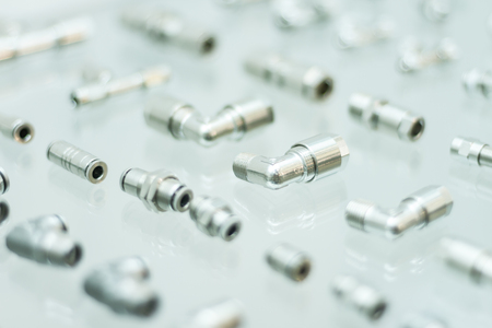 Detailed metal pneumatic adapters for pneumatic pistons for heavy industryの写真素材