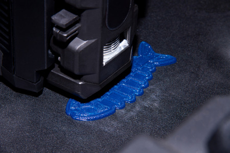 3D printer prints difficult shaped detail in 3D form plastic. Example of using in manufacturing or...
