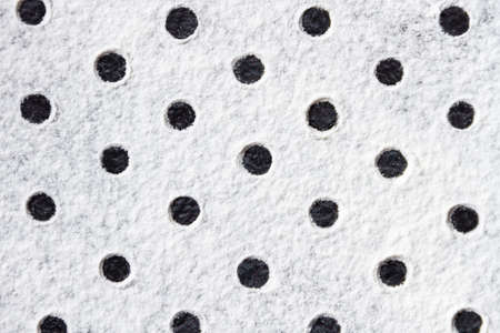 Geometric ornament with dots pattern from white flour sand, powder on table. Natural, organic...